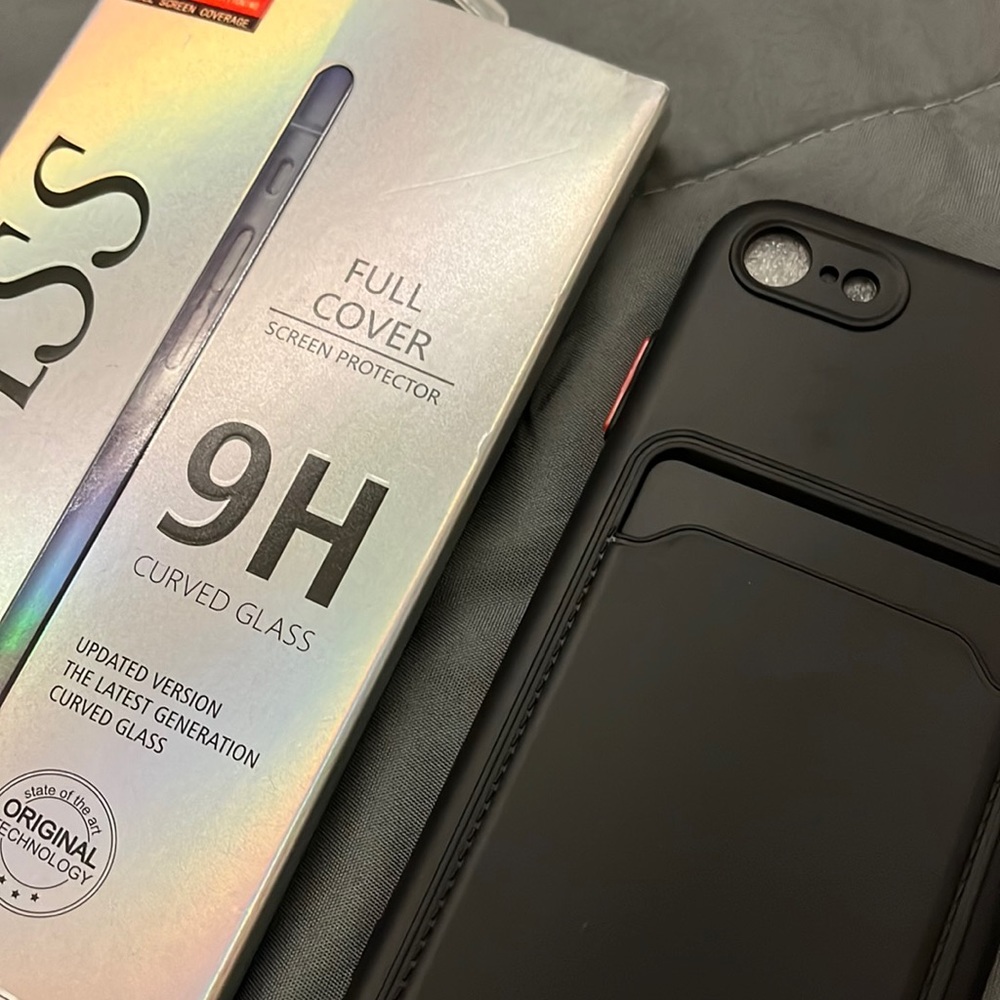 1 black iphone case and 2 privacy screen protectors